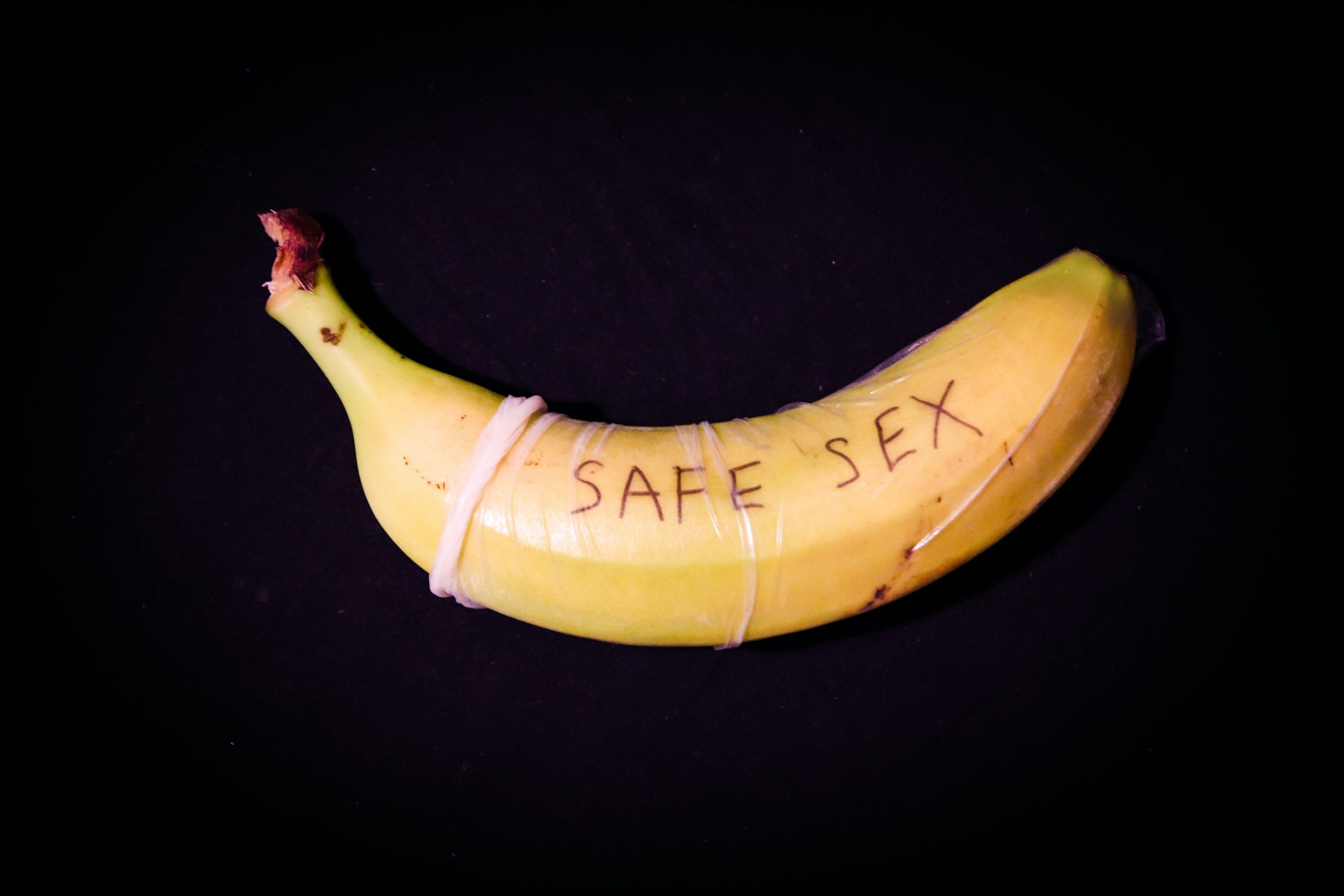 A banana with the words safe sex on it
